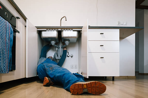 Professional Drain Cleaning technician working in Adel, IA